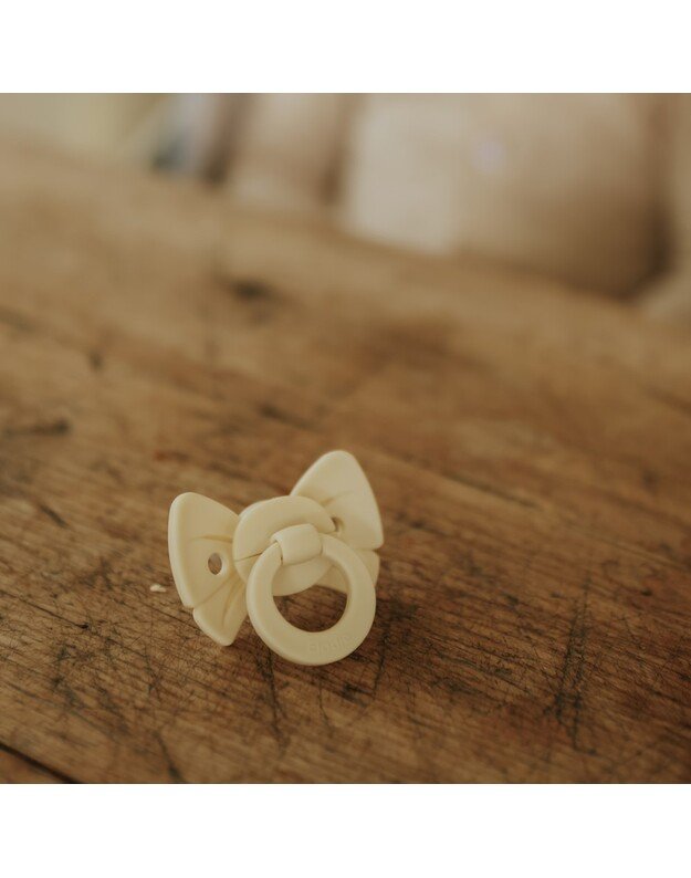Elodie Details silikoninis čiulptukas 0-6 mėn. Binky Bow - Oat White